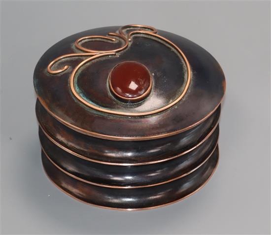 Sam Fanaroff. A circular copper box and cover inset red cabochon stone numbered 2014 diameter 14.5cm